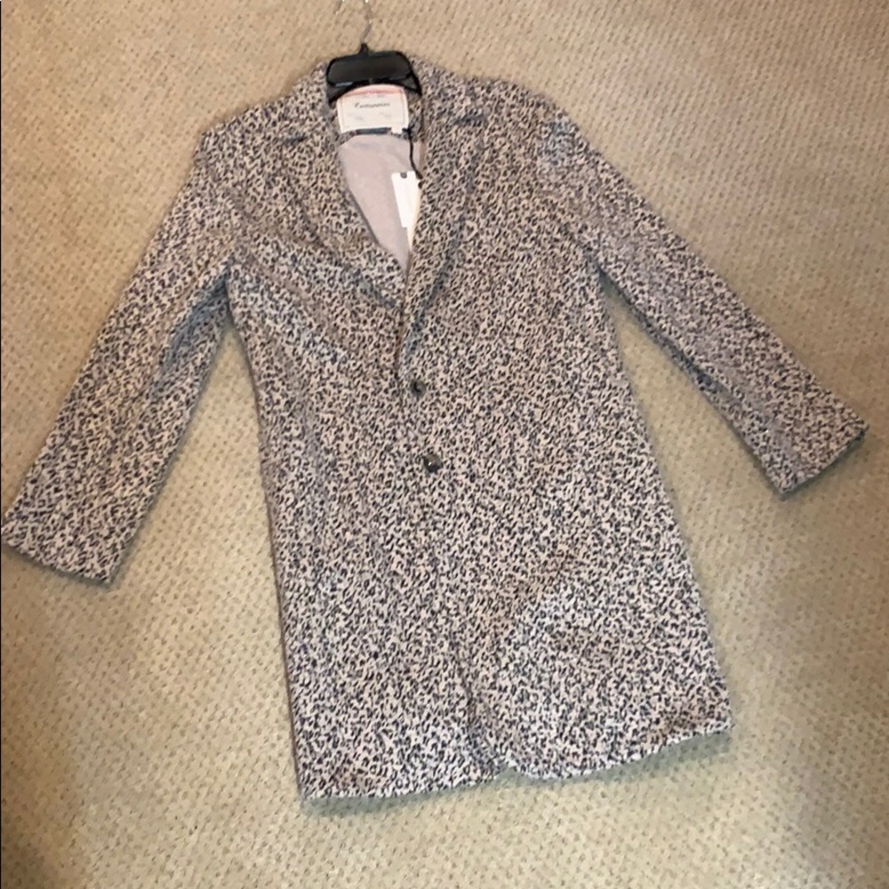 Above the knee soft 2 button light weight jacket.